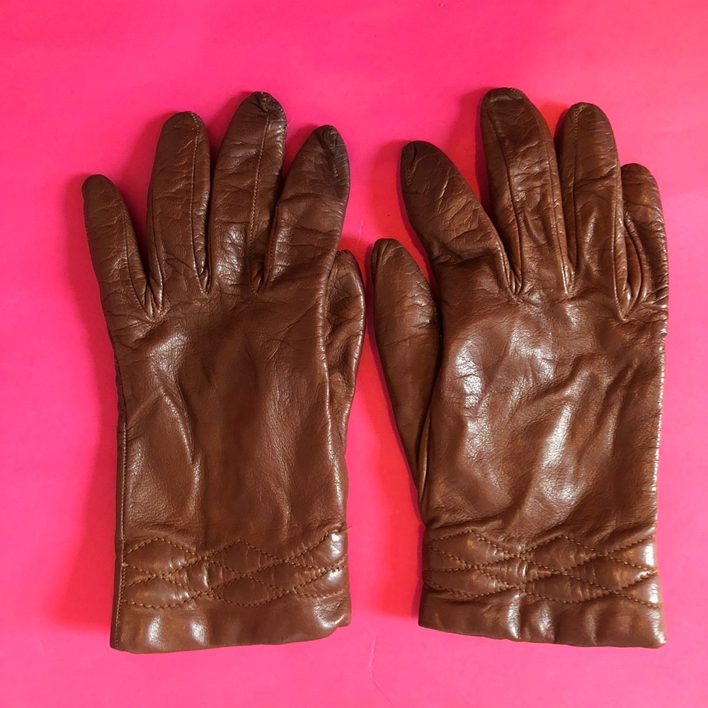 Brown leather gloves, wool lining.